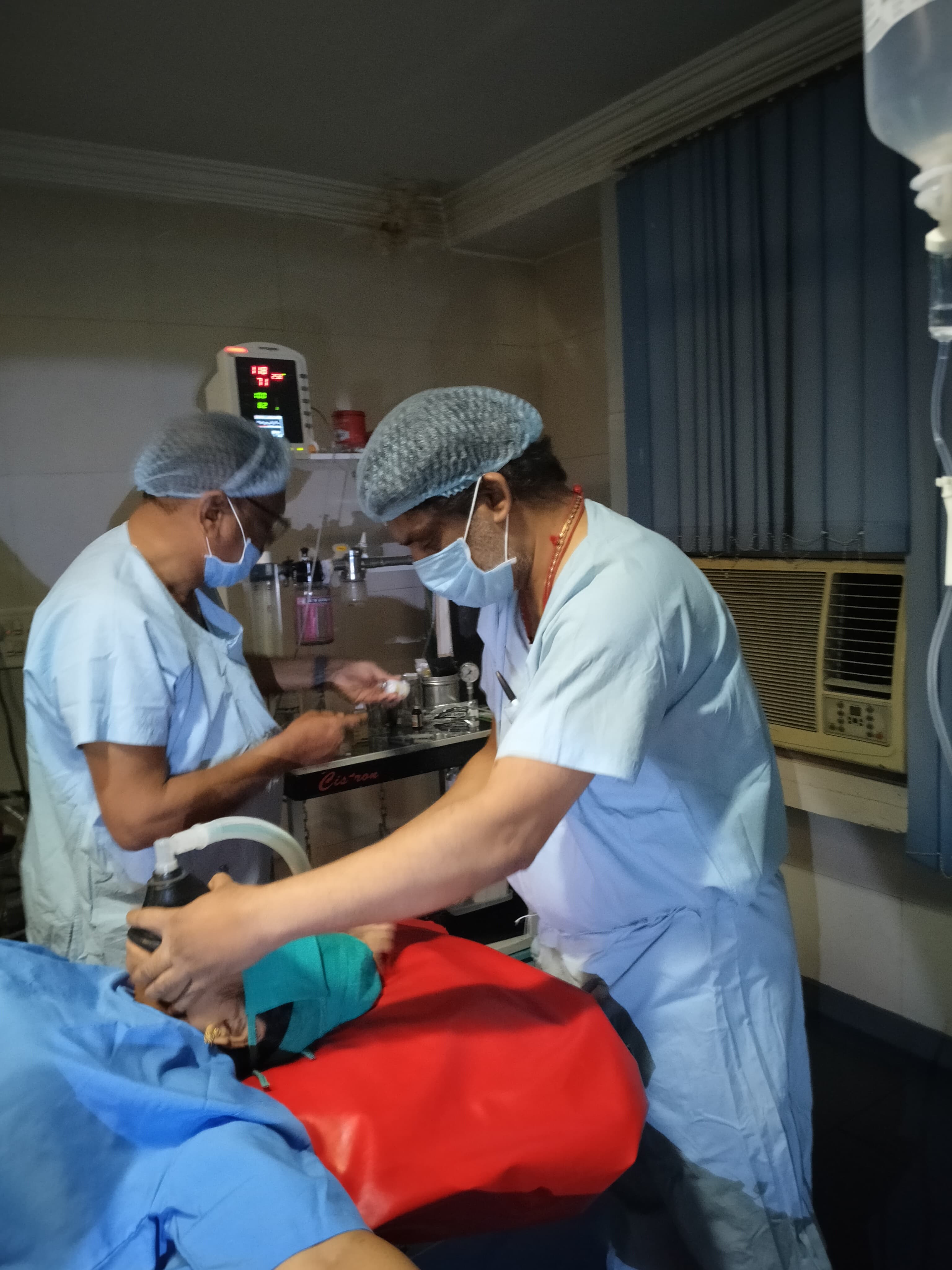 Happy couple holding baby