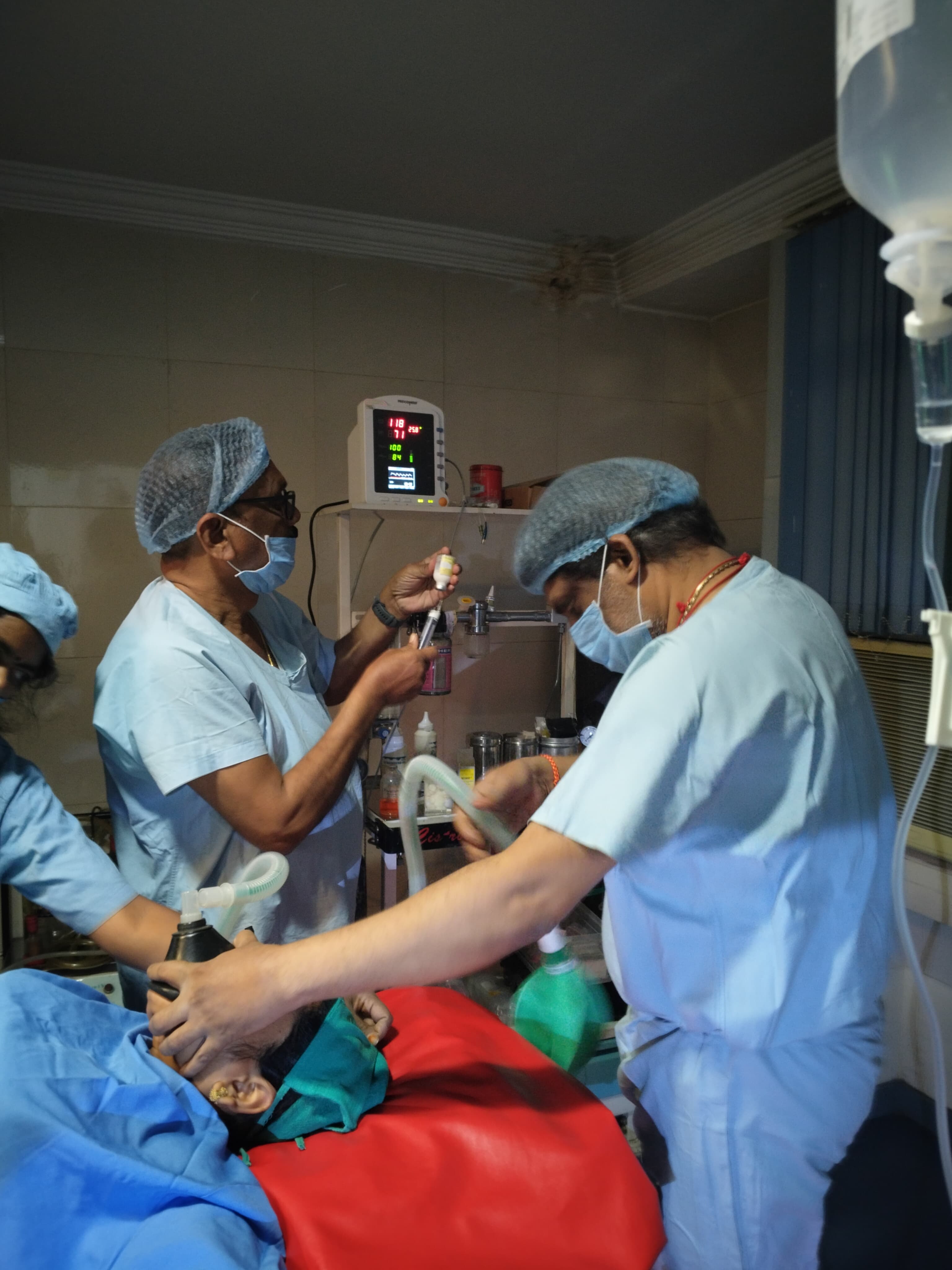 Happy couple holding baby